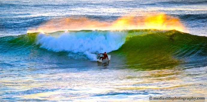 A surfer enjoying some waves at Windansea Beach, CA