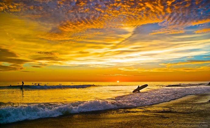 A Longboarder after a day of surfing Swami's
